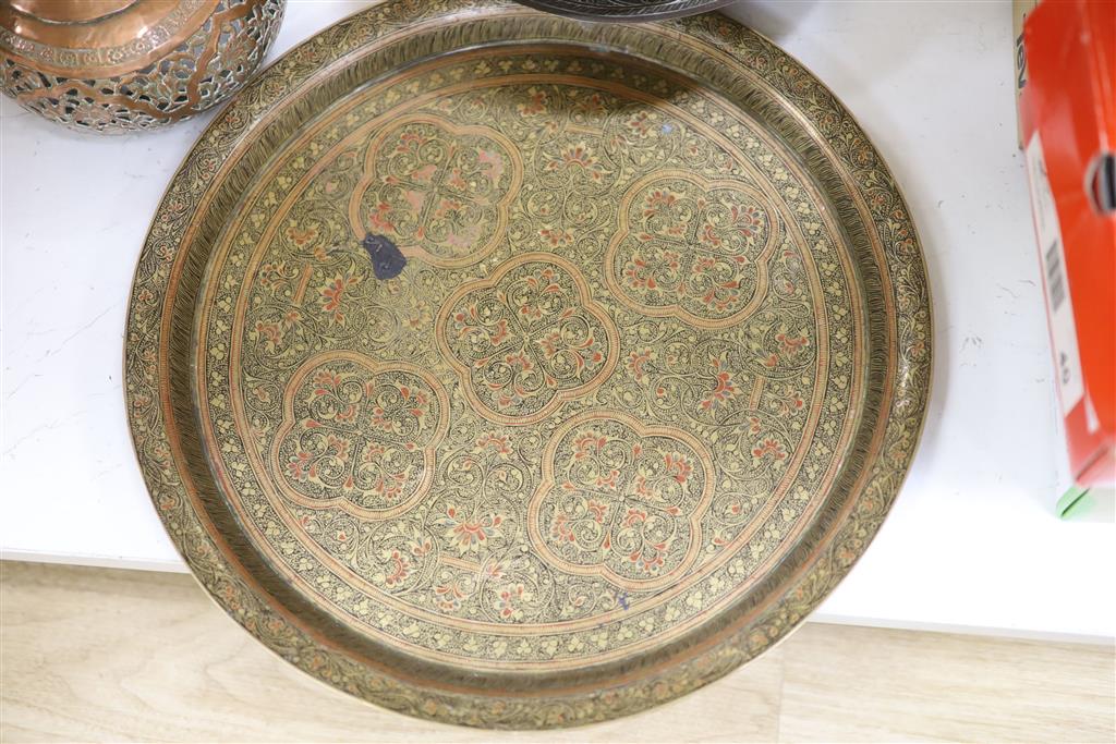 A group of Asian and copper trays, bowls etc